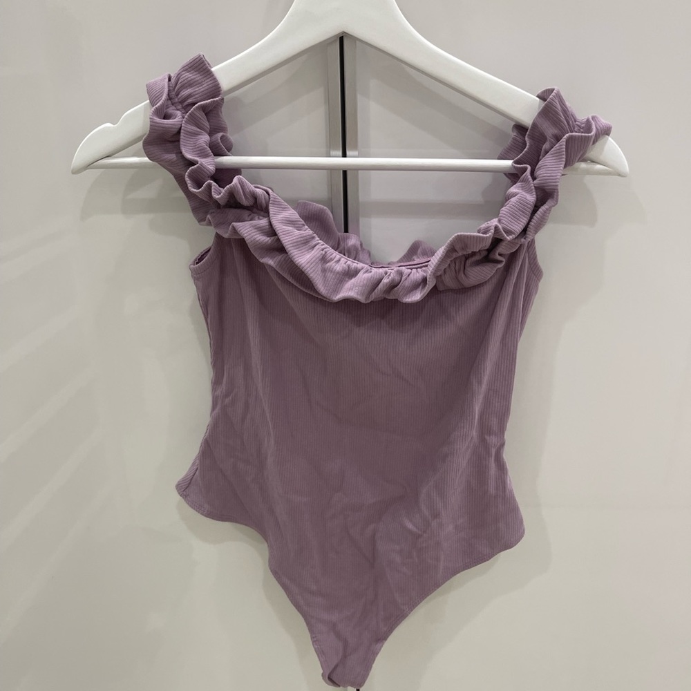 Purple body suit. Off the shoulder. Size small.